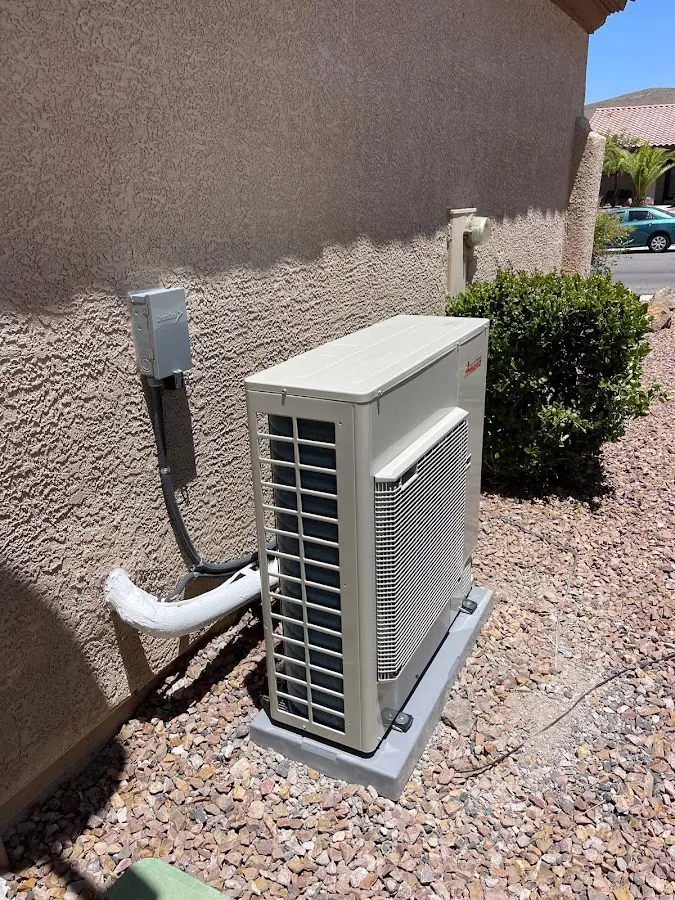 Residential air conditioning condenser unit in Reminderville